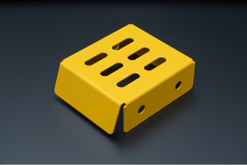 Beispiel für ein pulverbeschichtetes Blechteil in der Farbe Gelb.